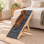 Adjustable Wooden Dog Ramp for Beds and Sofas — dog using ramp by a bed