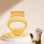 Shell Pet Grooming Comb with Curved Teeth and Finger Grip shown in the product photo