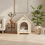 Cream and natural wood indoor pet house with a cat