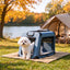 Blue collapsible pet carrier at a campsite