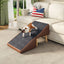 Brown pet ramp beside a sofa with a small dog