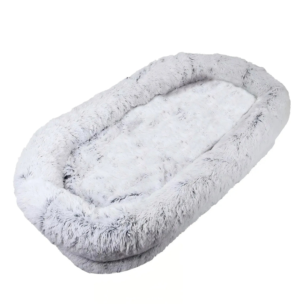 Oversized light gray faux fur human dog bed