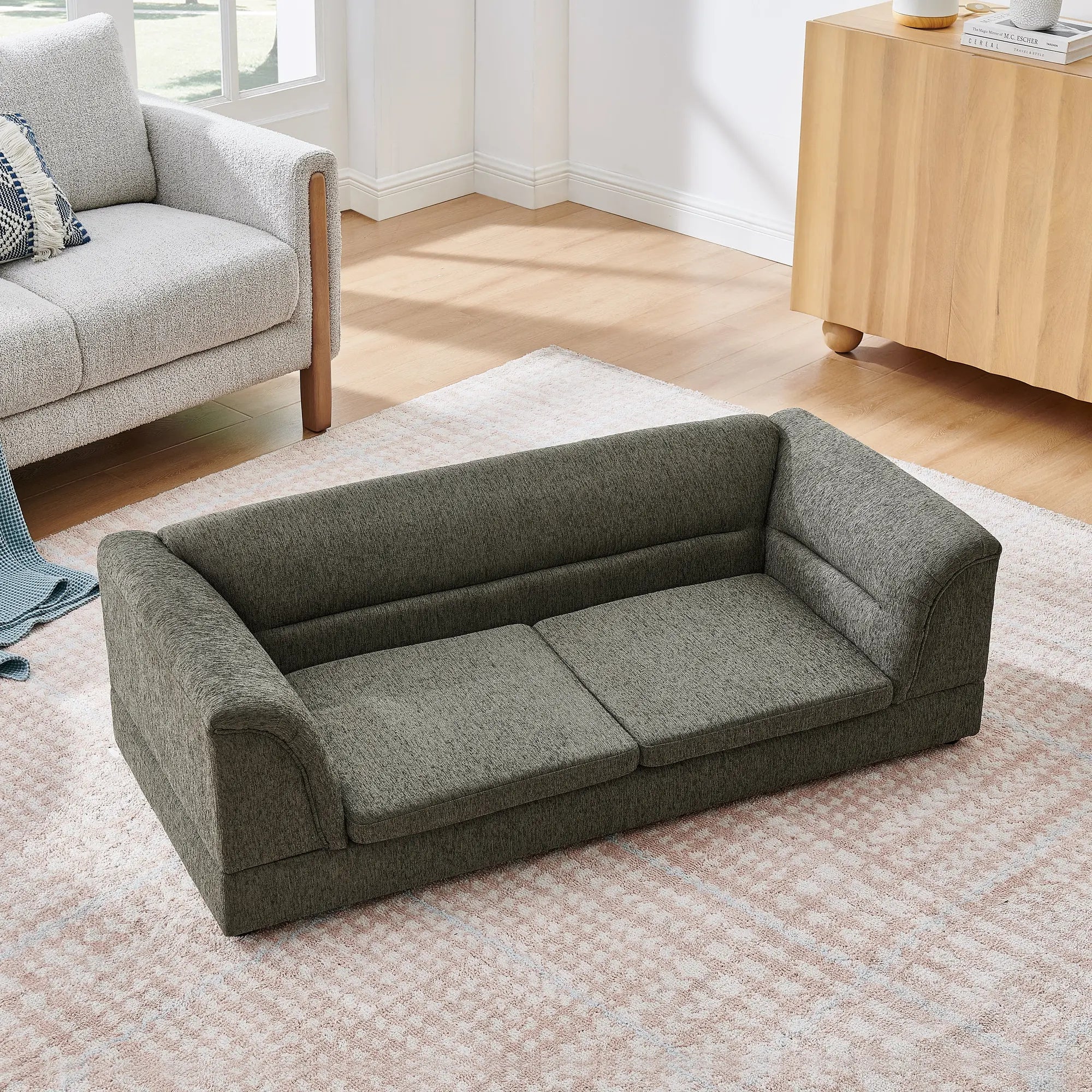 Top view of oversized dark gray dog sofa