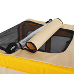 Roll-up cover and mesh roof on yellow dog bike trailer