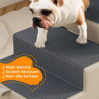 Dark non-slip walking surface on light gray dog stairs