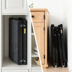 Folded dog ramp stored beside furniture