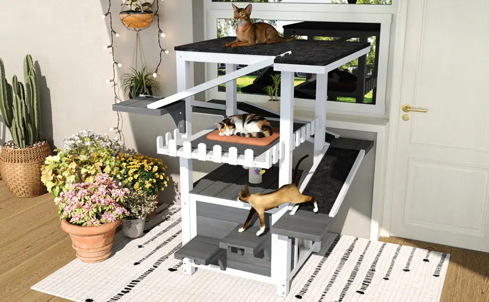 Gray and white four-tier outdoor cat house with ramps and waterproof roof — usage example
