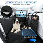 Black waterproof dog car hammock with supportive hard bottom — lifestyle view