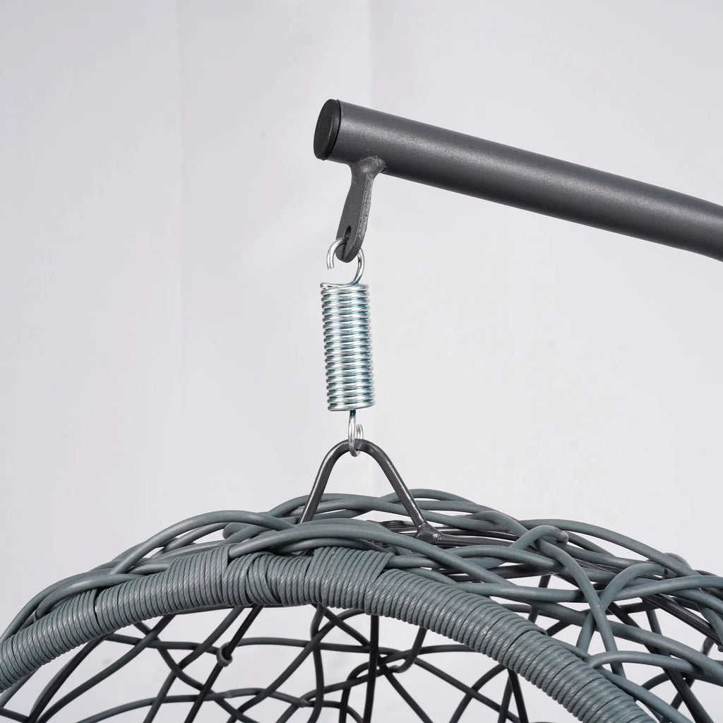 Gray rattan-style hanging cat swing bed with cushion and stand — close-up detail
