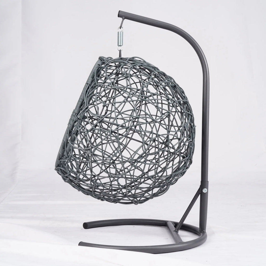 Gray rattan-style hanging cat swing bed with cushion and stand — storage view