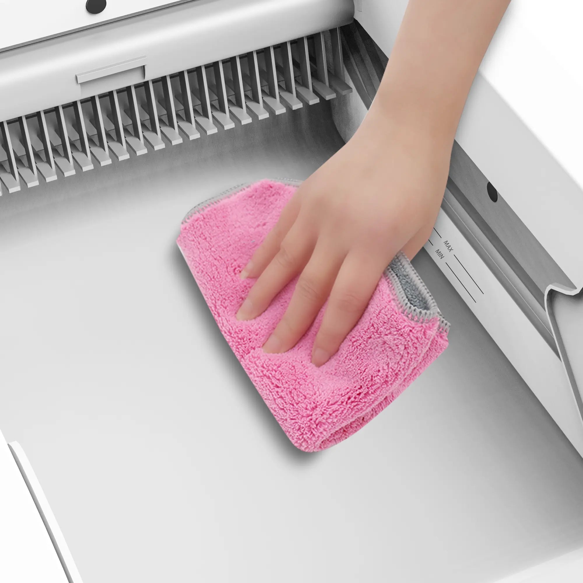 Smooth litter box interior being wiped clean