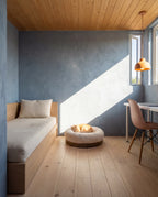 Round pet bed in a bright indoor corner