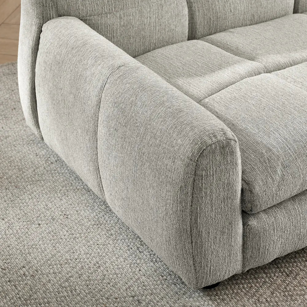 Rounded armrest detail on beige elevated dog sofa bed