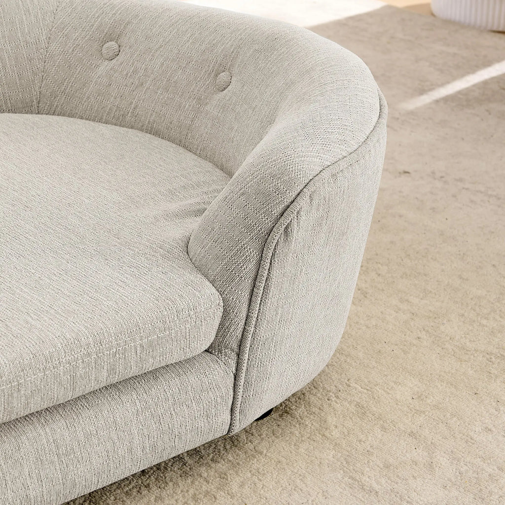 Rounded side and cushion detail on oval dog sofa