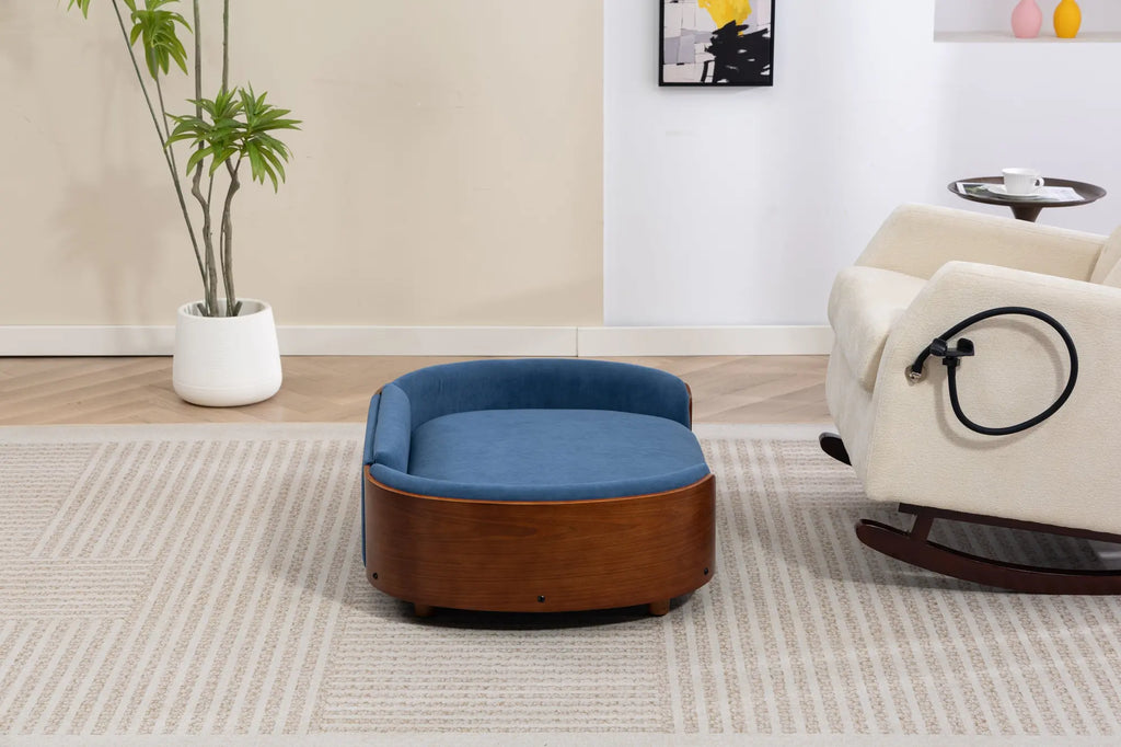 Rear view of a blue velvet wooden dog sofa