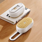 White cat mist grooming brush with swivel loop handle