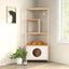 White and light oak corner cat tower in a living room