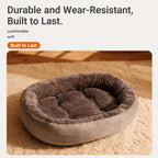 Oval pet bed resting surface