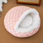 Pink patterned shell cave bed with white plush lining