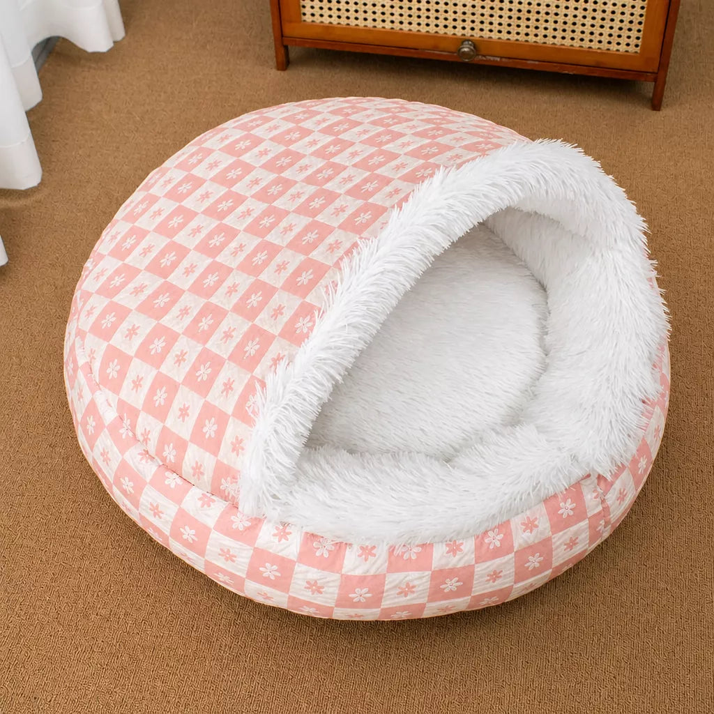 Pink patterned shell cave bed with white plush lining