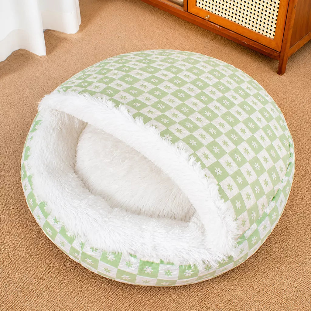 Green patterned shell cave bed with white plush lining