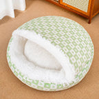 Green patterned shell cave bed with white plush lining