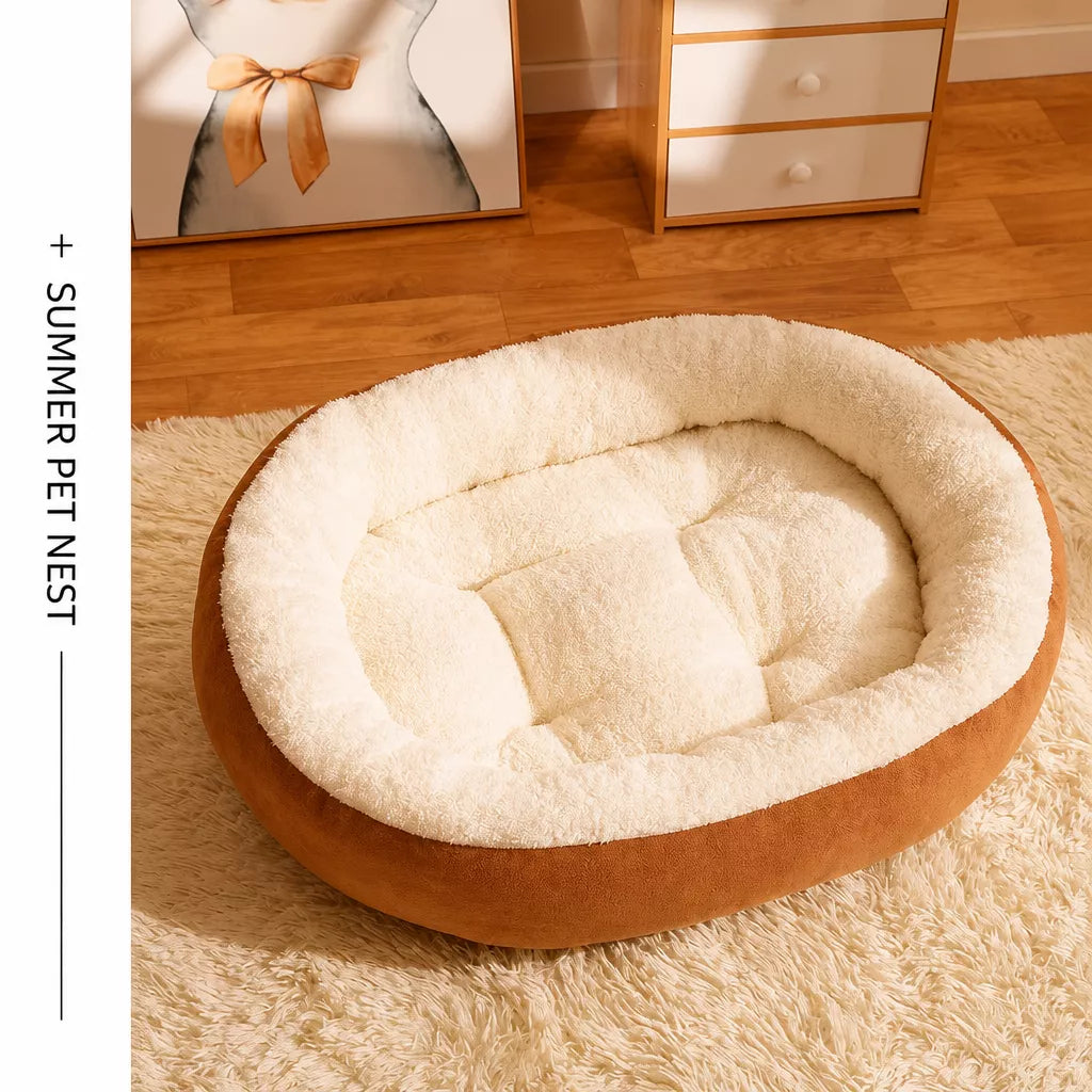 Cream-lined orange oval pet bed