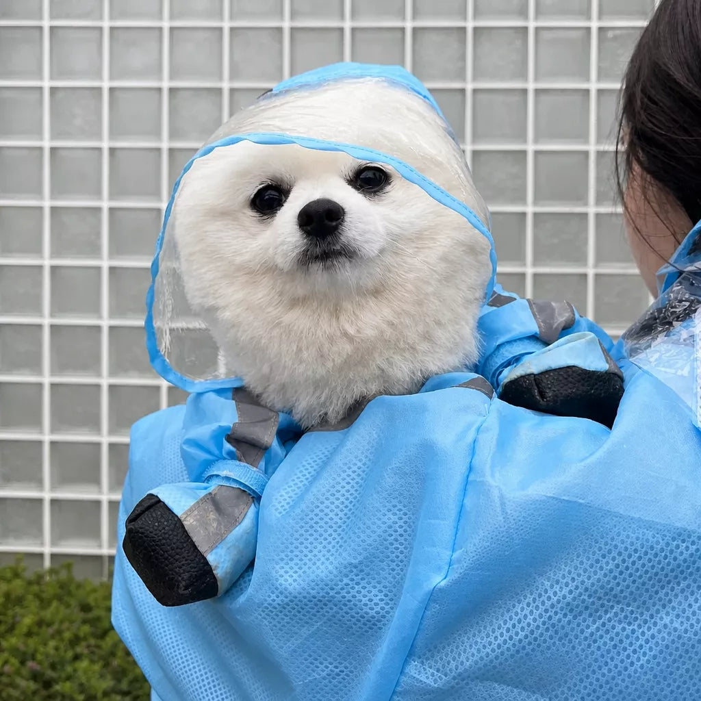 Leash opening at the back of the blue dog rain suit