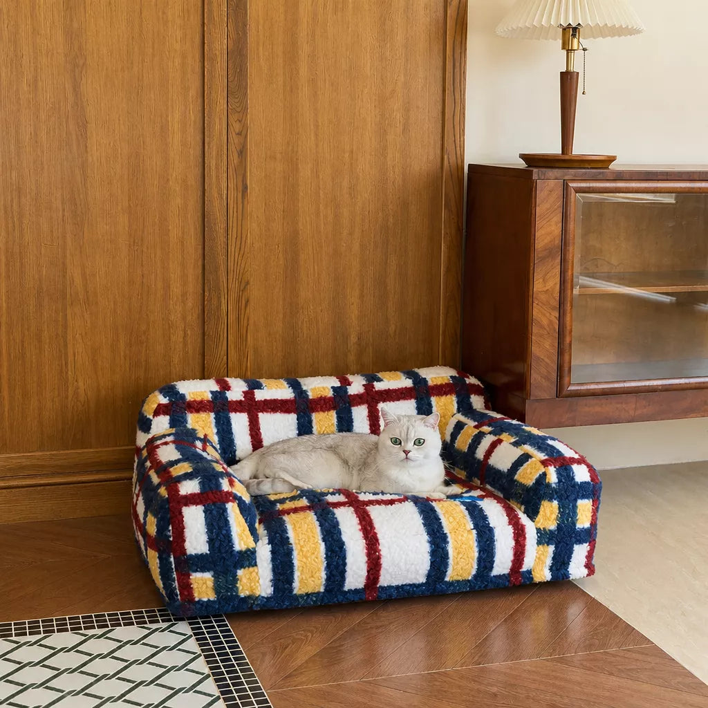 Multicolor pet sofa beside a room partition