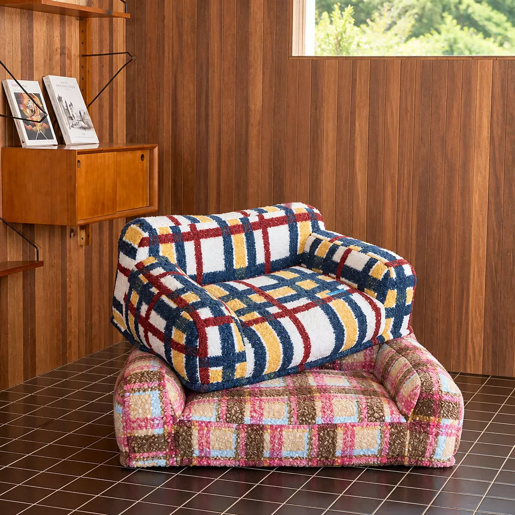 Two plush pet sofa beds in a room