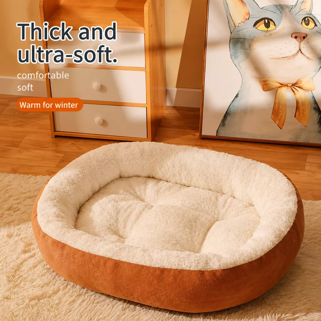 Orange-and-cream oval fleece bed