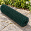 Green Coated Chicken Wire Roll 196.85 ft — wire roll on a garden patio