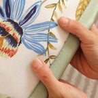 Close-up of smooth ice silk floral couch cover fabric