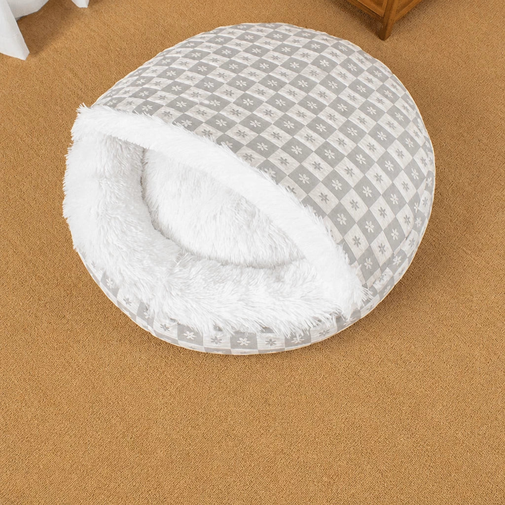Gray patterned plush shell bed in a home setting