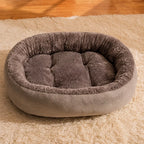 Brown oval pet bed resting surface