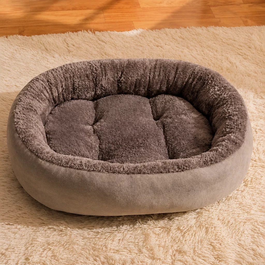 Brown oval pet bed resting surface