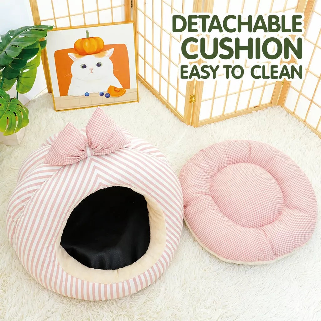 Pet cave bed with its removable cushion shown separately