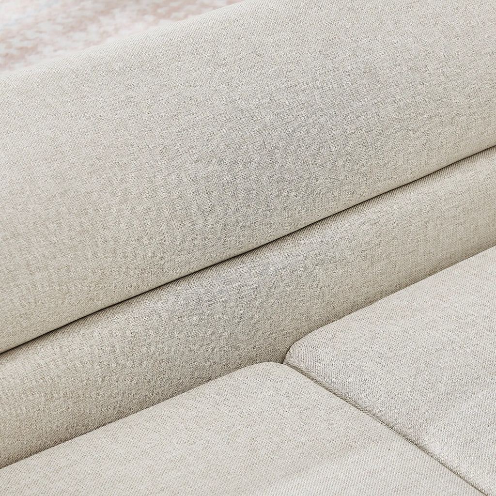 Beige linen upholstery close-up on a dog sofa