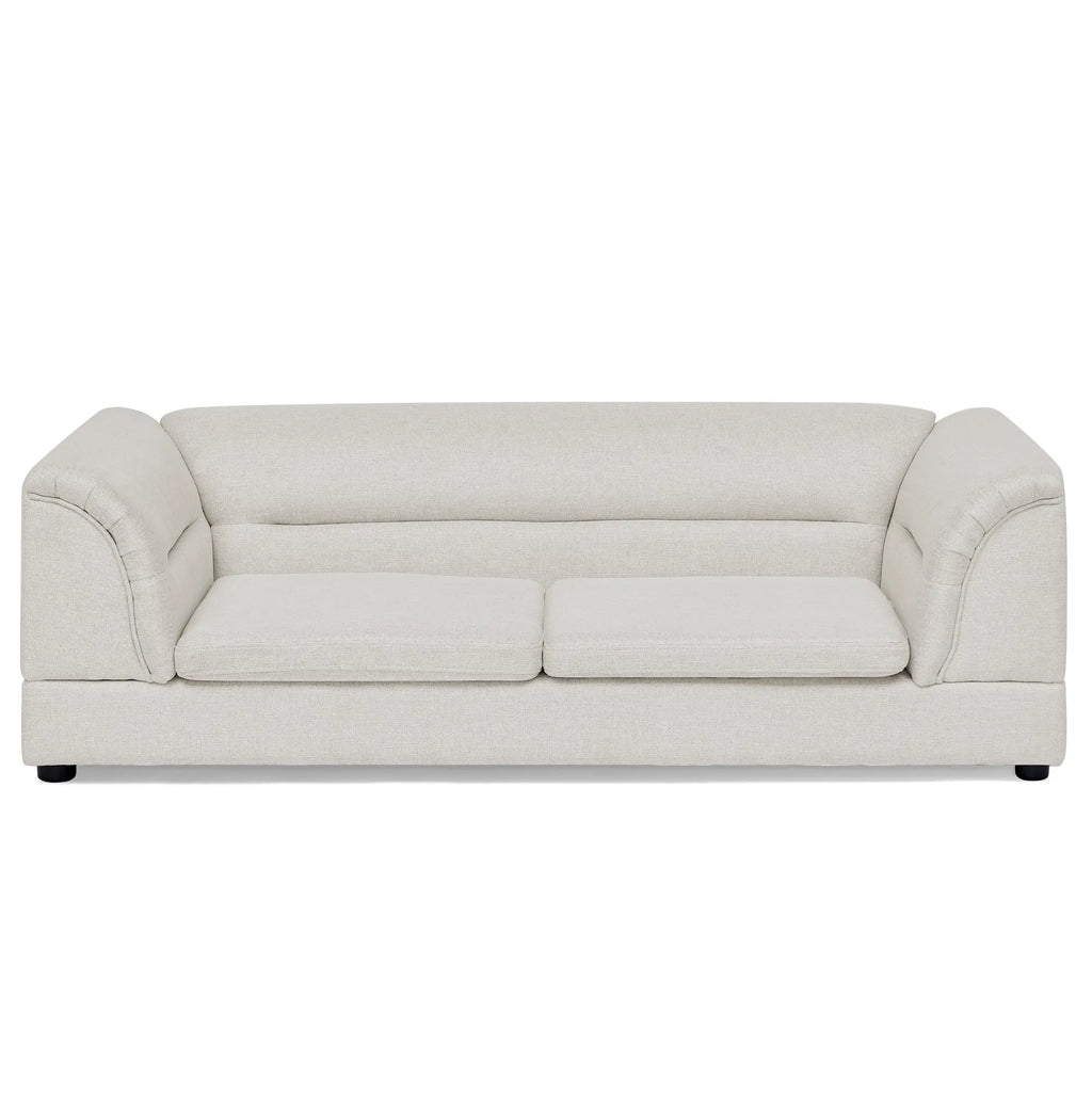 Front product view of an oversized beige dog sofa