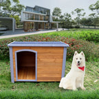 Raised Wooden Dog House with Sloped Roof — wooden dog house in a garden