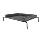 Side view of gray raised dog bed with three-sided pillow