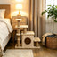 Beige adjustable cat stairs beside a bed