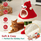 Christmas cat tree beside a resting cat