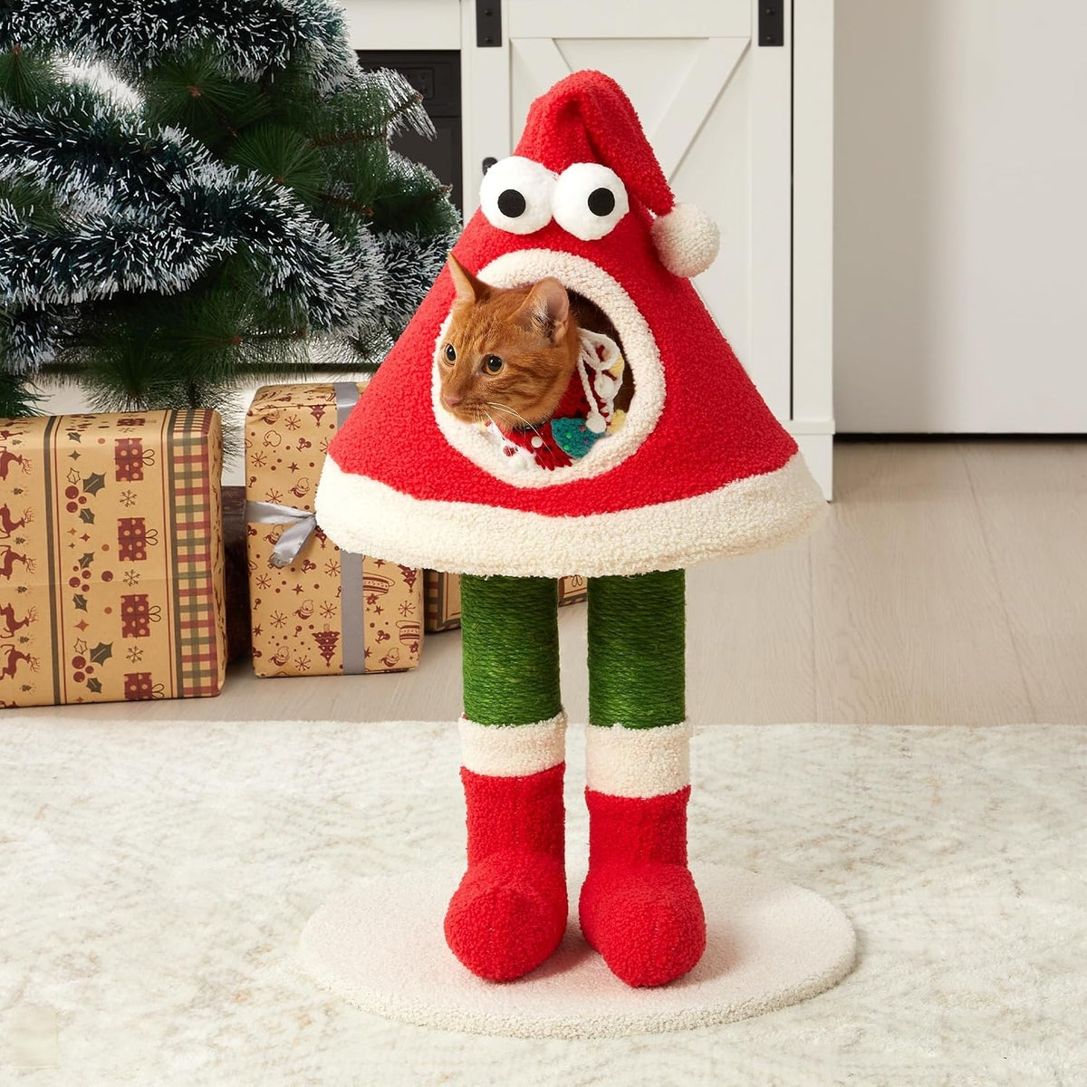 Cat peeking from the Christmas hat hideaway