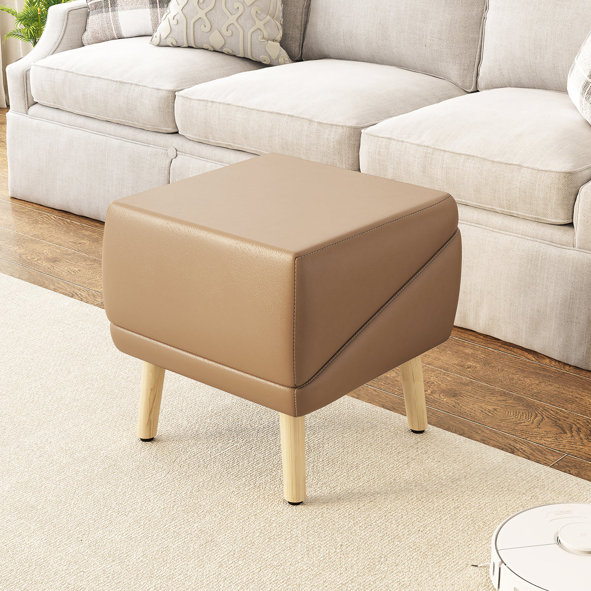 Coffee ottoman beside sofa