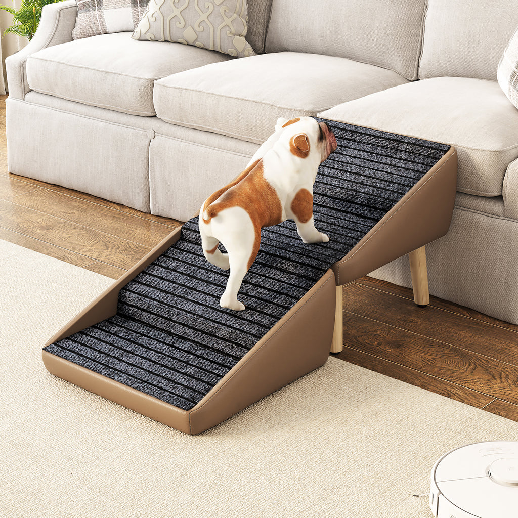 Side view of dog using pet stairs