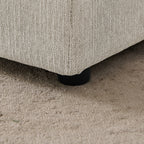 Beige upholstered dog sofa — low feet