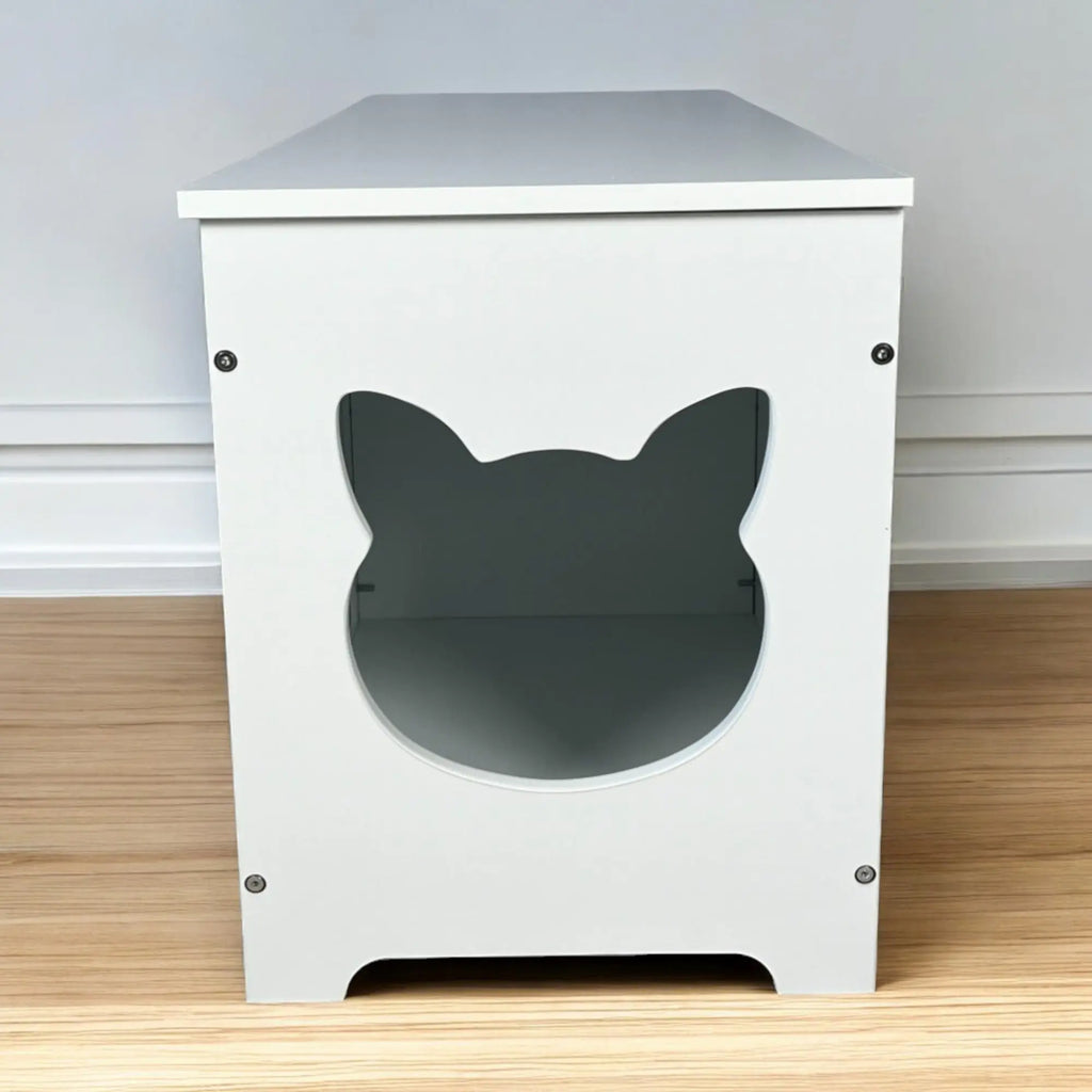 Cat-shaped side entrance on hidden litter box cabinet