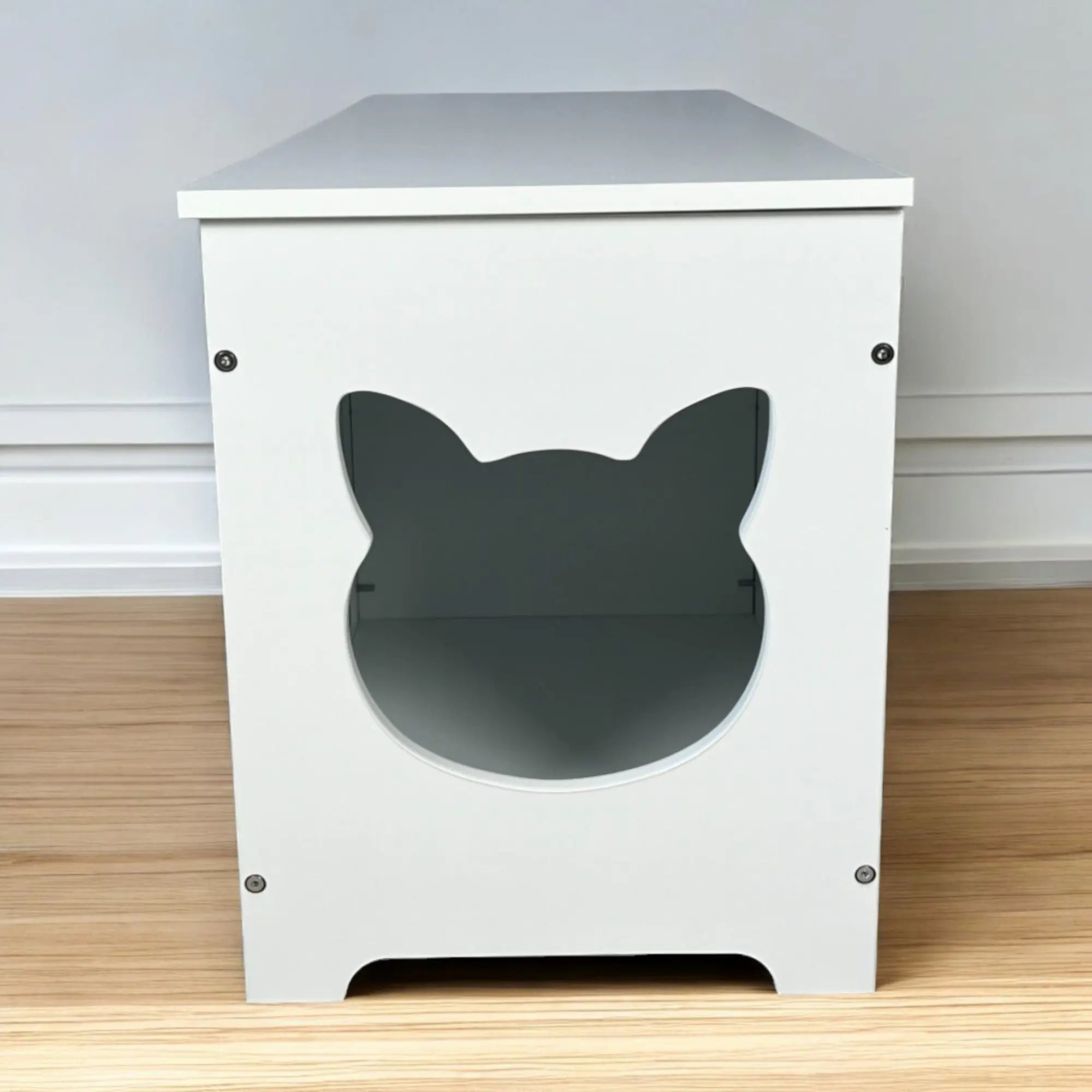 Cat-shaped side entrance on hidden litter box cabinet